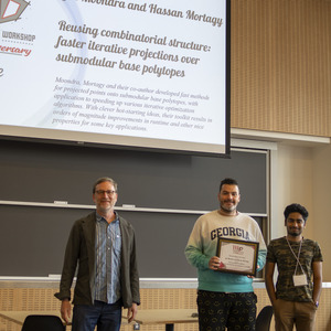 Jon Lee with Best Poster Honorable Mention awardees Jai Moondra and Hassan Mortagy