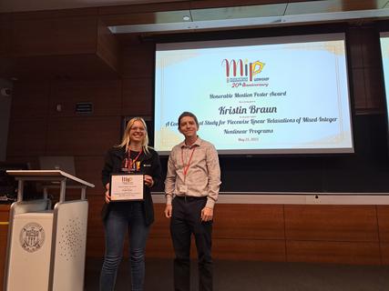 Thiago Serra (Poster Competition jury Chair) with Honorable Mention awardee Kristin Braun
